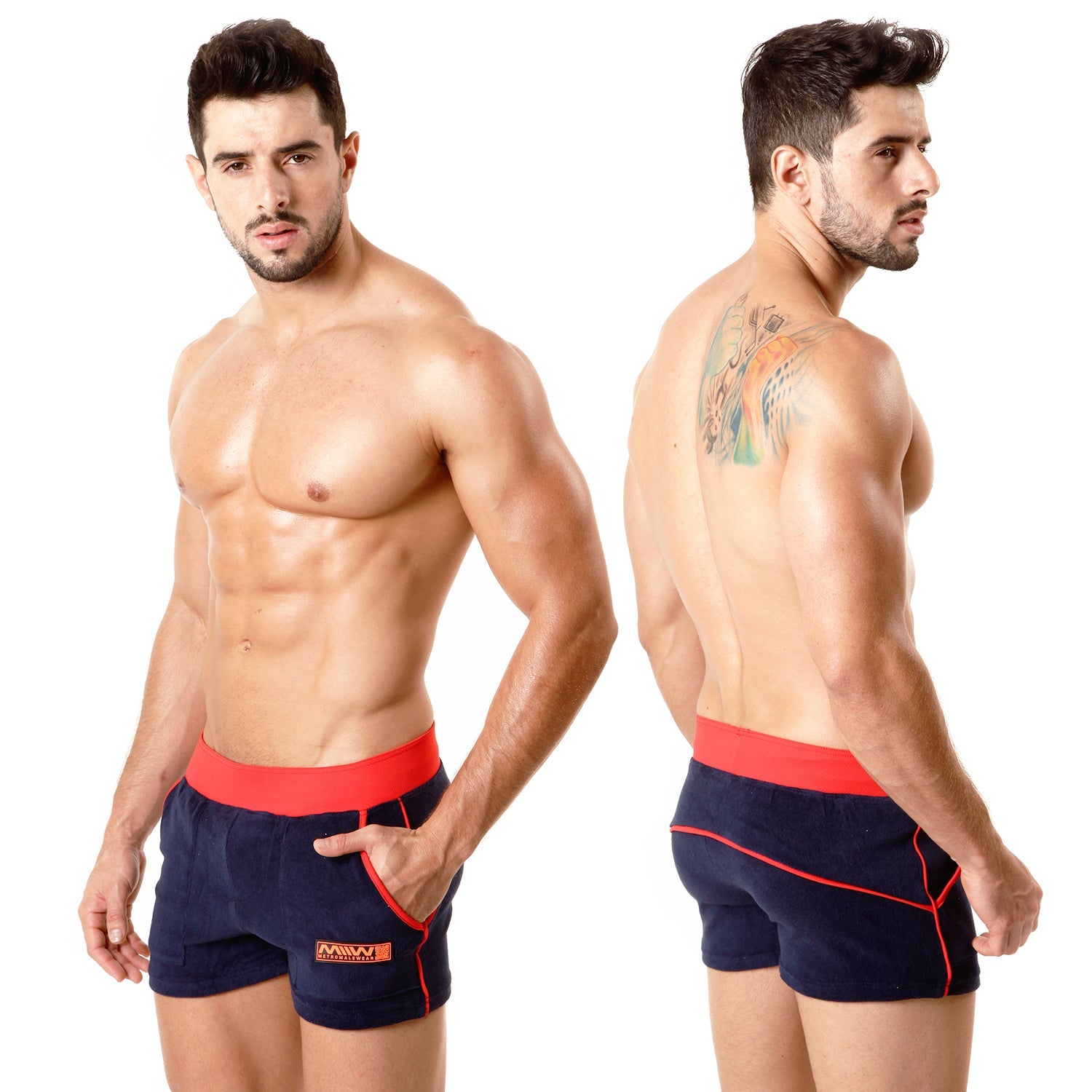 Navy blue terry sport shorts by metrmalewear with red elastic waistband side trim and small orange logo on lower left leg