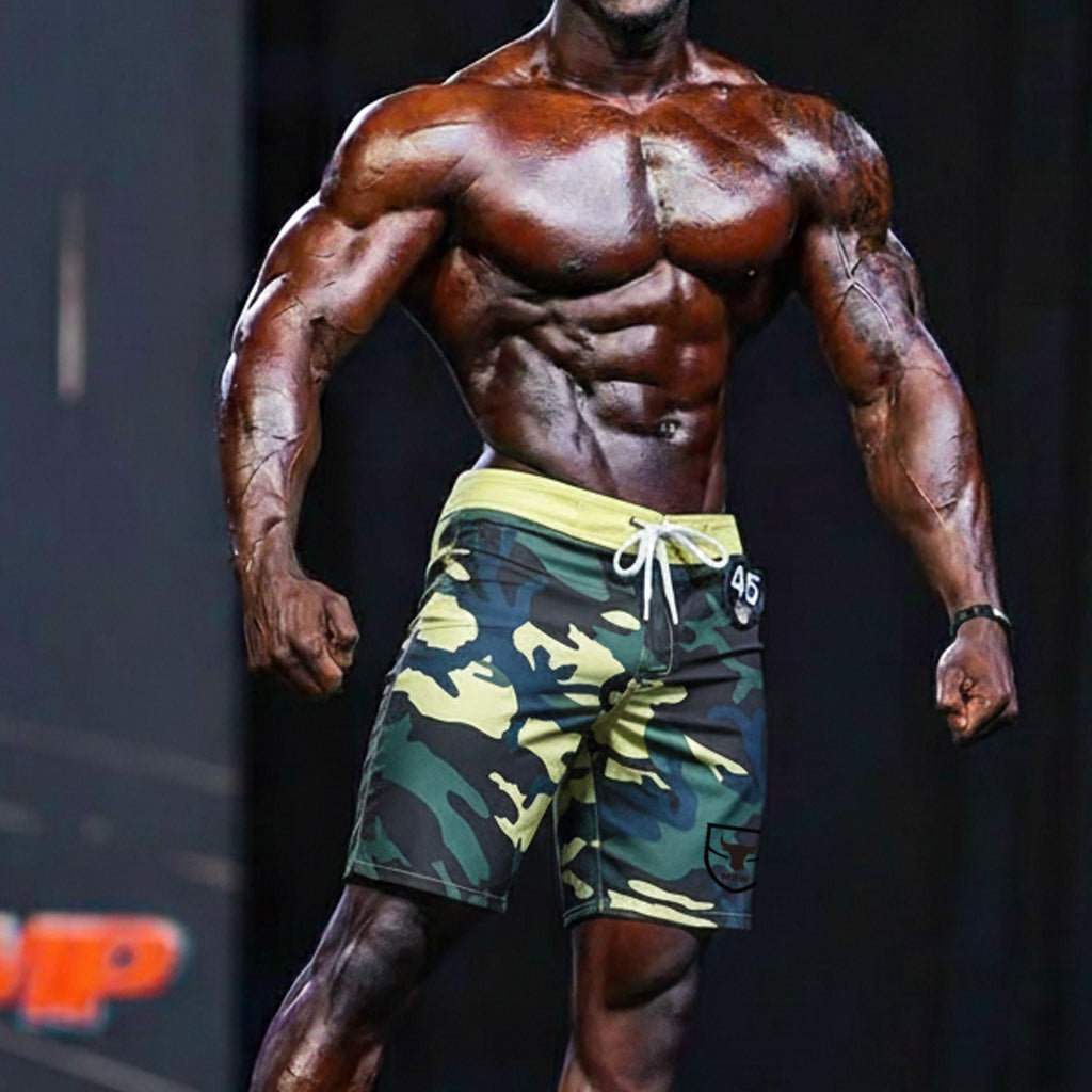 MetroMaleWear physique board short yellow camo with green and yellow camouflage, white drawstring, and black side patch
