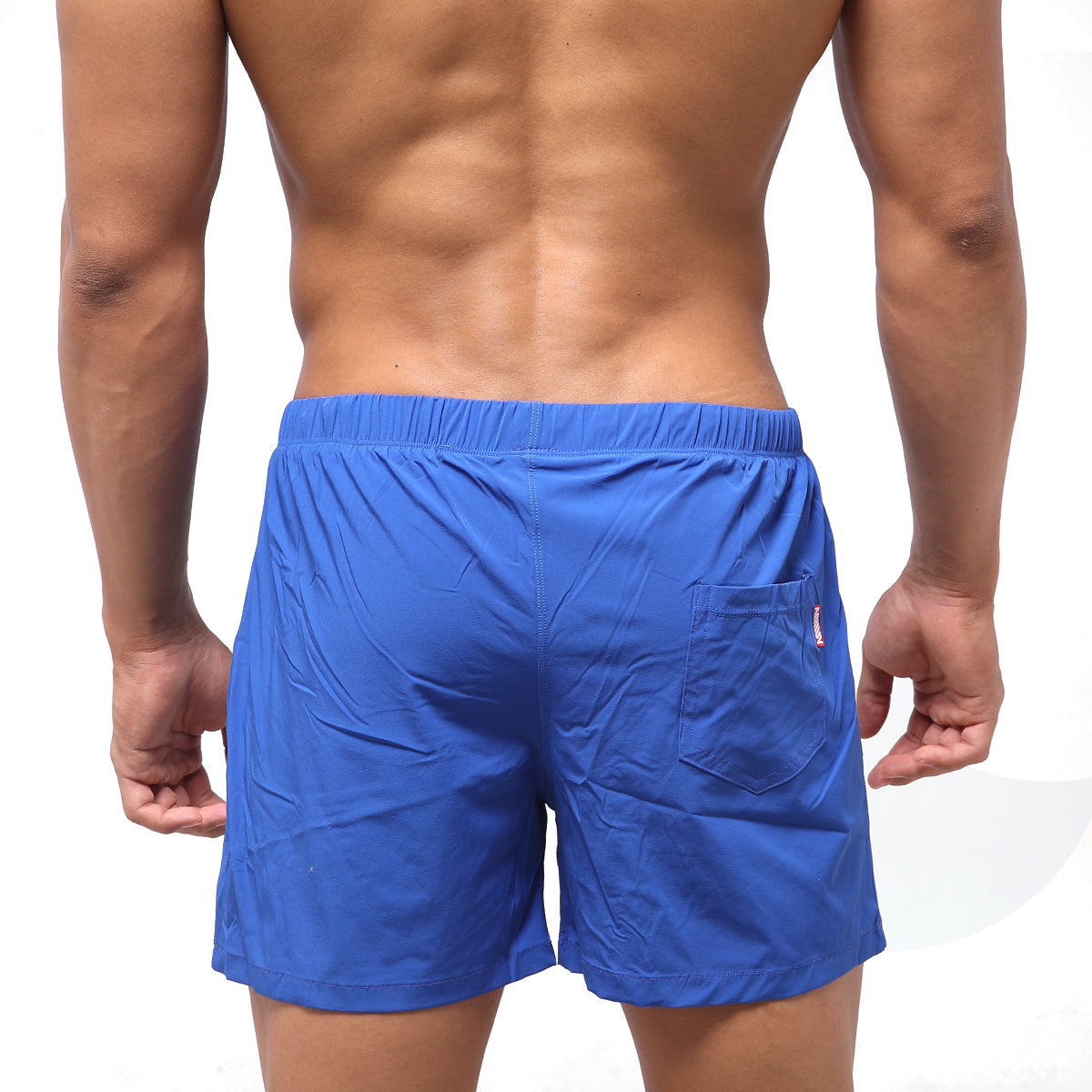 Bright blue MetroMaleWear flexible swim trunks with elastic waistband and single side pocket for athletic use