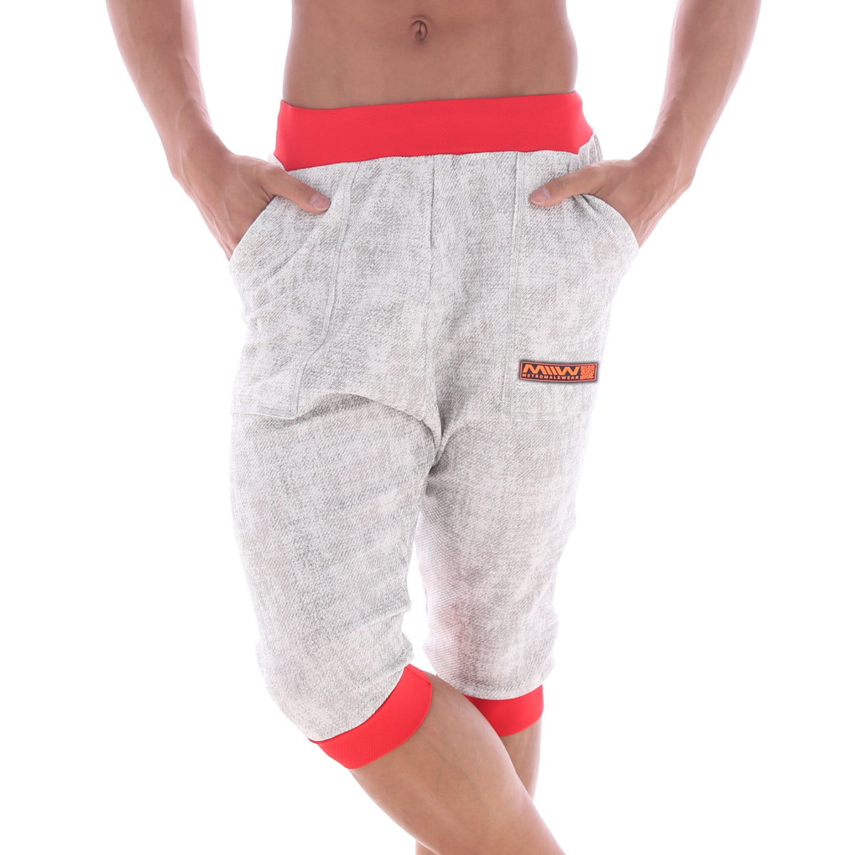 Gray heathered capri pants with red elastic waistband and cuffs featuring orange logo patch for gym by metro malewear scandinavia