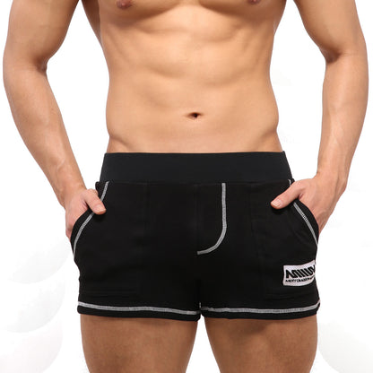 Metro male wear boston black athletic shorts with white stitched trim and mind mettomar logo patch on lower right leg
