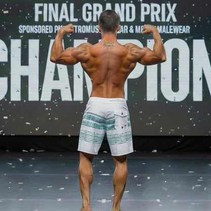 White board shorts with teal horizontal stripes and front pocket from metronealewear metroMuscleWear innocent physique collection