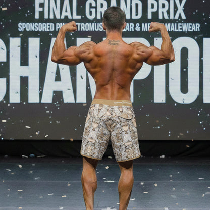 A pair of beige and brown snake-print MetroMaleWear MetroMuscleWear honeycomb physique board shorts with tan waistband