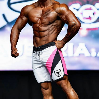 MetroMalewear metroMuscleWear IFBB Pro men’s pink white and black athletic board shorts with diagonal stripes and logo patch