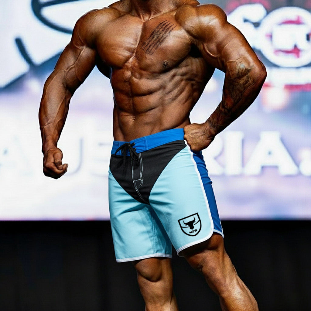 Metro malewear metro musclewear ifbb pro mens physique board short blue and black with white logo on lower right leg