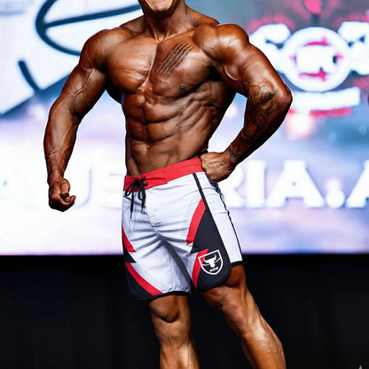 White and red MetroMaleWear MetroMuscleWear IFBB Pro men’s physique board shorts with black accents and bull logo