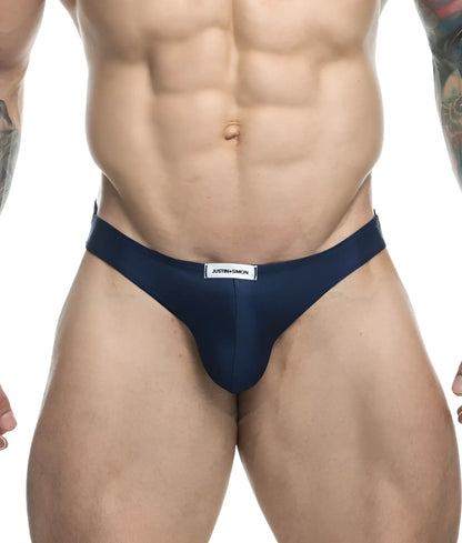 Navy blue justin and simon classic mens bikini briefs with a white label on the waistband made from soft fabric