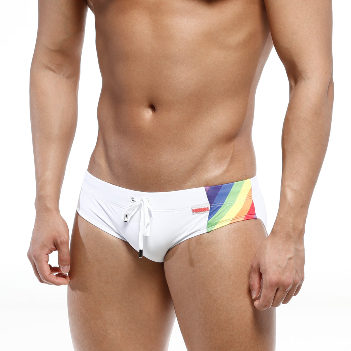 MetroMaleWear rainbow swim brief white featuring vibrant rainbow side stripe and small red brand tag for swimming