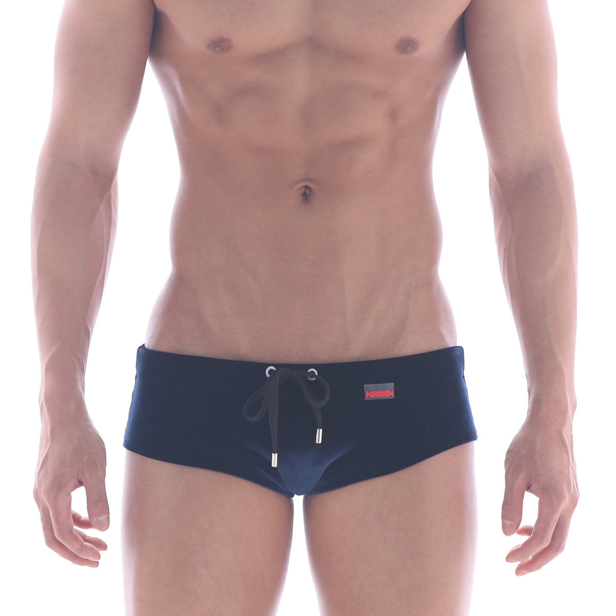 Navy blue velvet swim brief by metromalewear with black drawstring silver aglets and small red brand tag on waistband