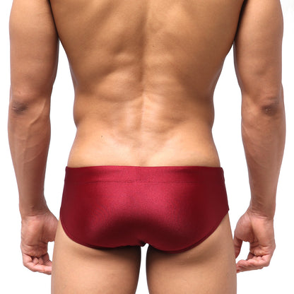 MetroMaleWear classic swim brief wine 4914-42 is a sleek satin-finish red snug fit swim trunk with a smooth design
