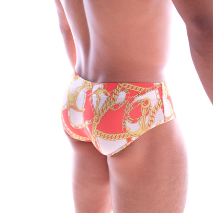 MetroMaleWear classic swim brief in red and white with bold gold chain and anchor pattern for stylish beachwear
