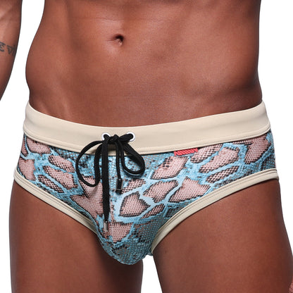 MetroMaleWear Piton swim brief turquoise with blue and pink snake-scale pattern cream waistband and black drawstring