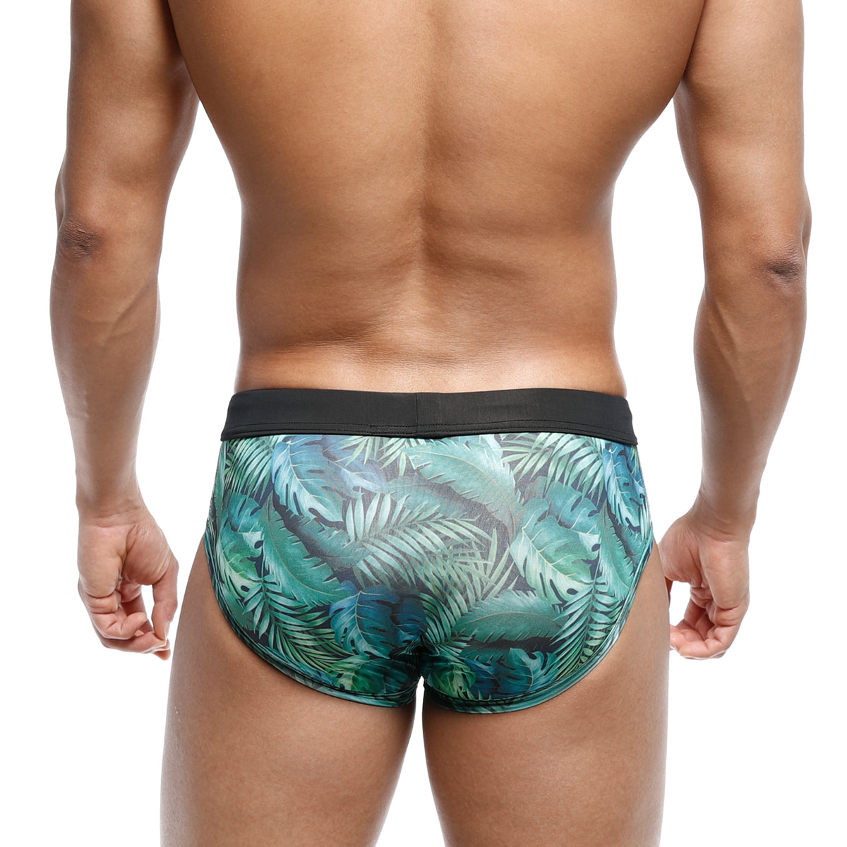 Men’s metro male wear swim briefs in green jungle leaf pattern with black waistband for tropical beachwear