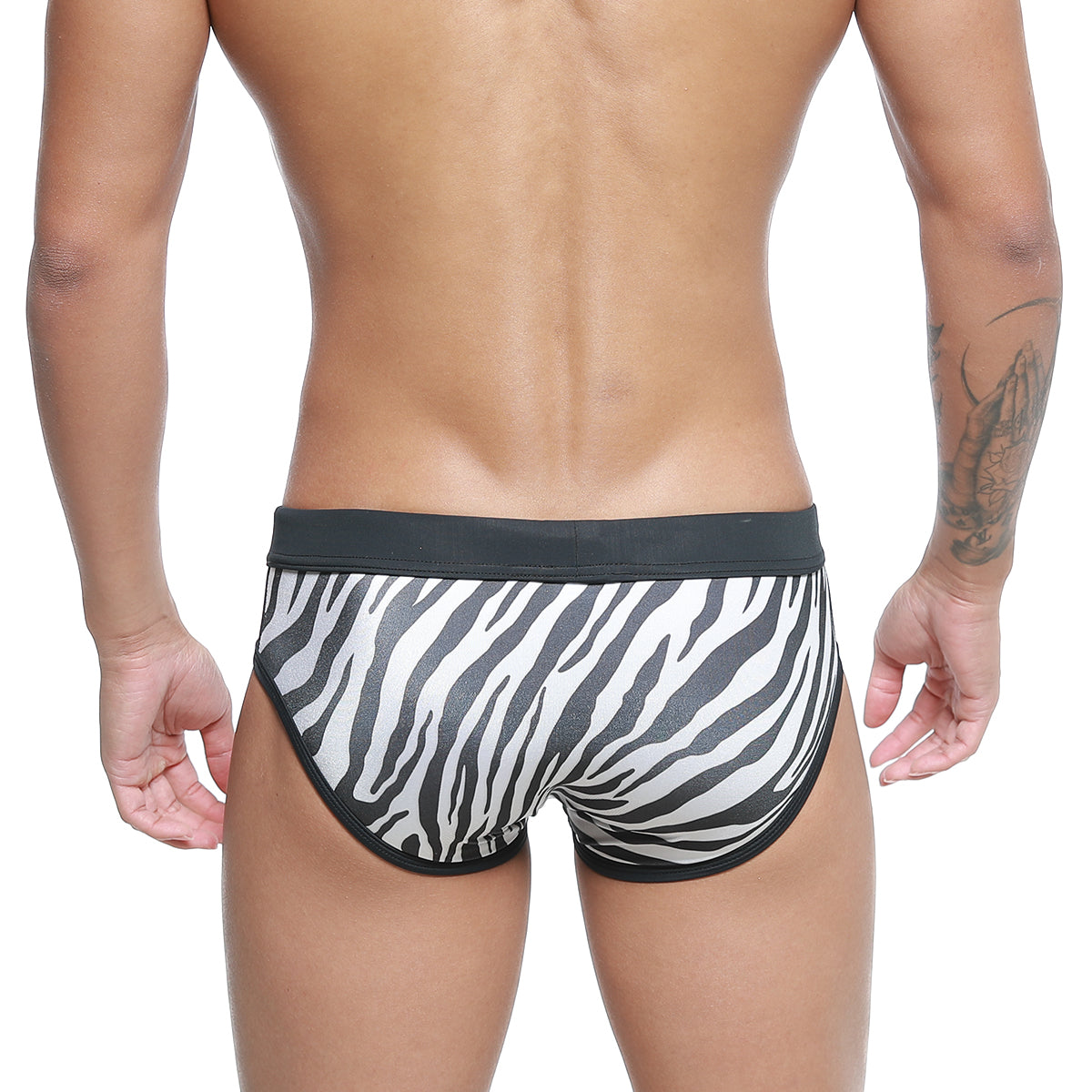 Black and white zebra-striped men’s briefs with a solid black waistband metroMalewear Kenya Swim Brief 4916-30