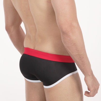 Black briefs metroMalewear pride swim brief with bold red waistband and white trim along leg openings