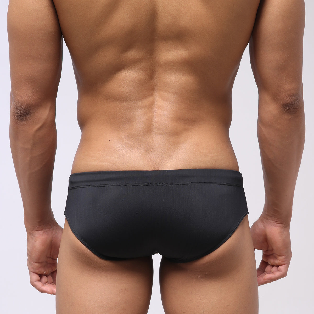 Black metroMalewear stripe swim bikini 4917-40 with smooth, form-fitting design for comfortable swimwear use