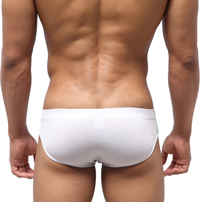 White form-fitting Italian swim bikini with seamless design by MetroMaleWear for stylish beachwear