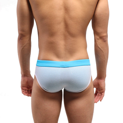 Light blue and white mesh swim trunks with a solid turquoise waistband from MetroMaleWear layered swim brief 4924-08