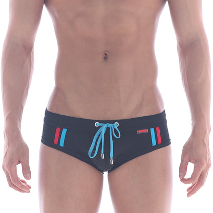 MetroMaleWear Europa swim brief black with vibrant blue and red side stripes and matching light blue drawstring bow