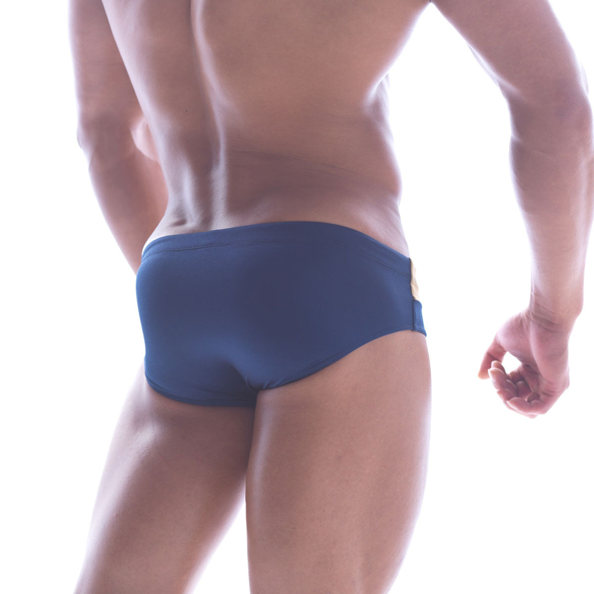 Navy blue MetroMaleWear Ibiza swim brief with gold metallic side seam accent ideal for stylish beachwear