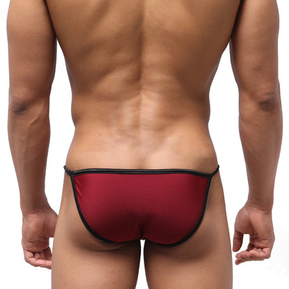 Red thong swim bikini with black trim from metromalewear dangerous swim in wine color, front view