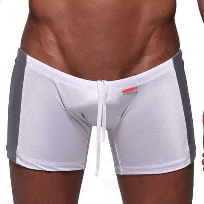 White and gray MetroMaleWear Extreme Square 4933-00 athletic swim trunks with shiny textured fabric and drawstring waistband