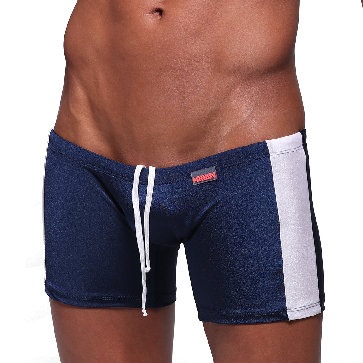 Navy blue MetroMaleWear Extreme Square swim trunks with white side stripes and matching drawstring waistband