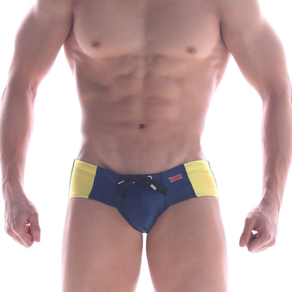 Blue and yellow MetroMaleWear panel swim brief with black drawstring waistband designed for comfortable swimming