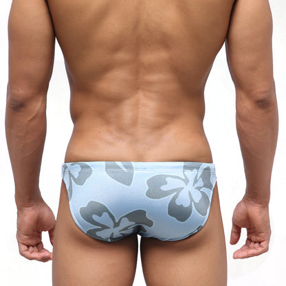 Light blue MetroMaleWear Classic swim bikini with bold gray hibiscus flower pattern ideal for beachwear