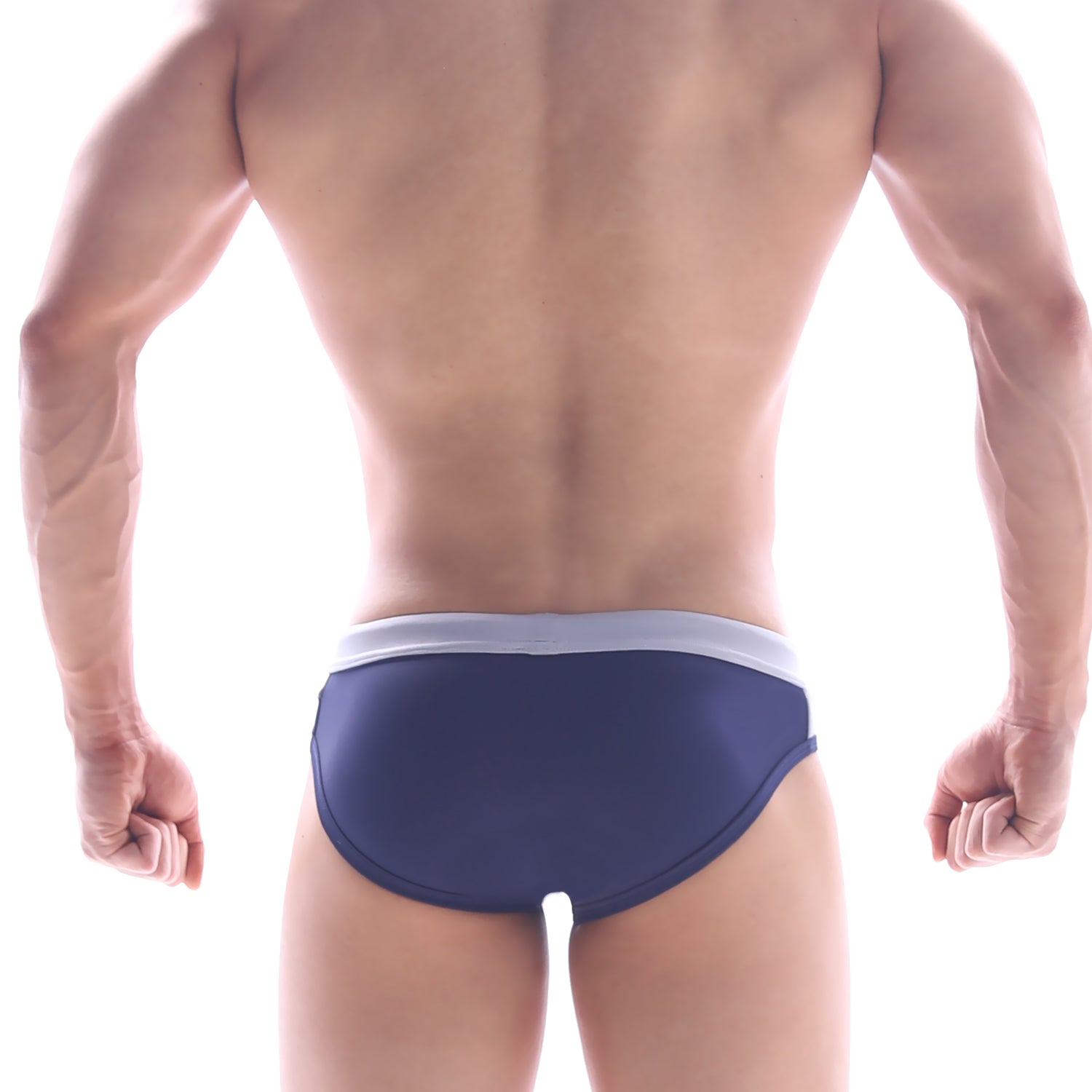 Navy blue MetroMaleWear STEEL swim brief with white waistband designed for comfortable swimwear use