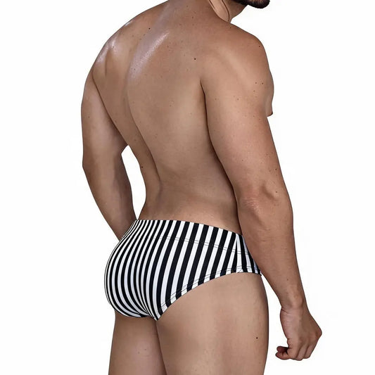 Men's swim brief in black and white stripes made by MetroMaleWear shown from the back on a model
