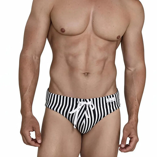 Black and white striped men's swim brief with a drawstring front worn by a model by MetroMaleWear M2W