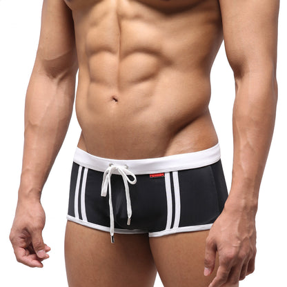 MetroMaleWear Fresco swim trunk black with white stripes and matching drawstring waistband for casual beachwear