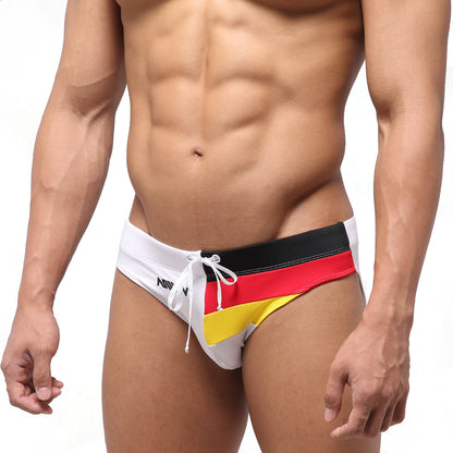 White swim trunks with bold black red and yellow german flag stripe design from MetroMaleWear Dutch Swim Brief 4946-31