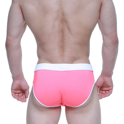 MetroMaleWear swim brief neon pink 4953-02 with bright pink swim trunks featuring a white waistband and trim