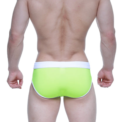 Bright lime green MetroMaleWear swim briefs with white waistband and trim designed for comfortable swimwear use