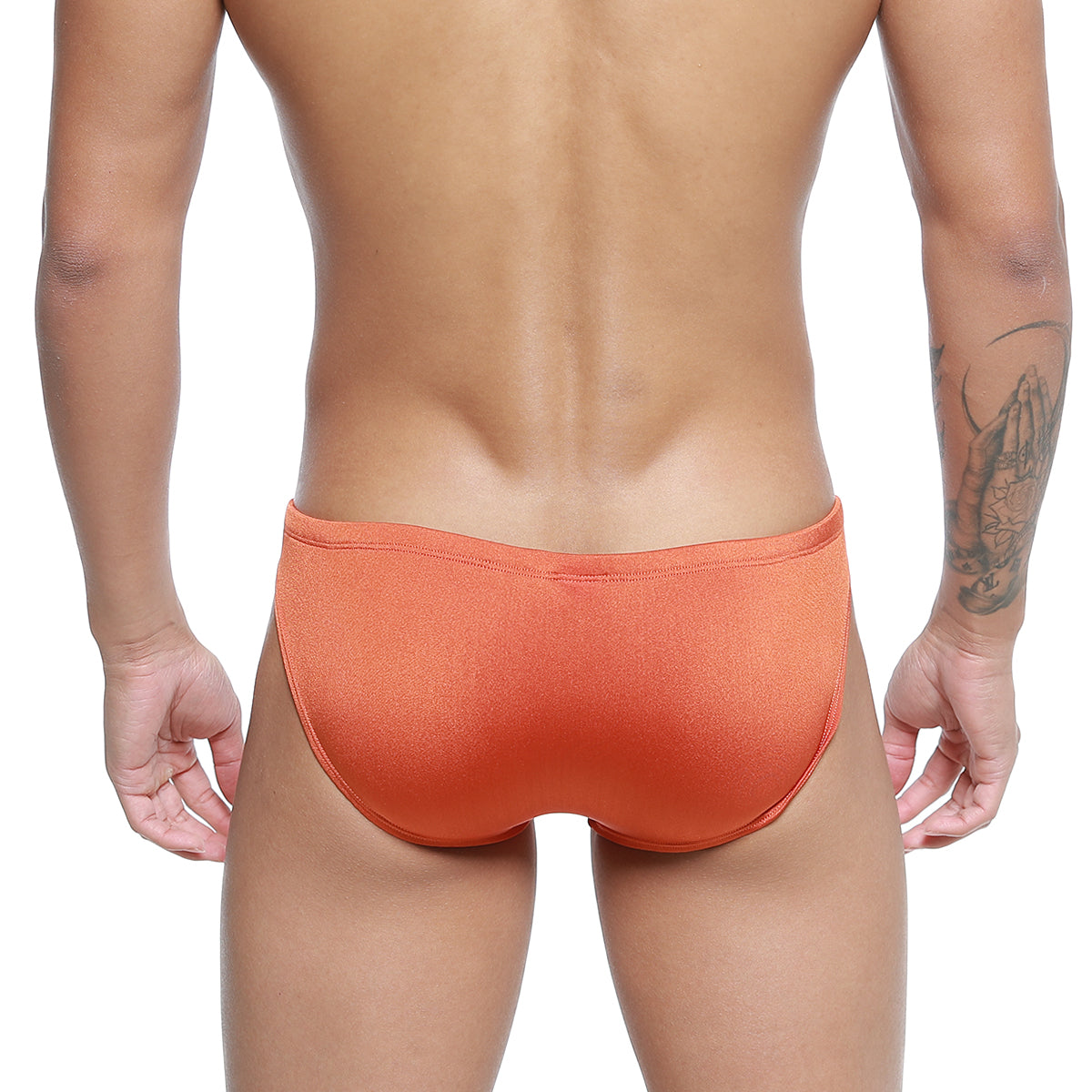 Orange textured silicon swim briefs by metro malewear in ochre designed for swimming and beachwear
