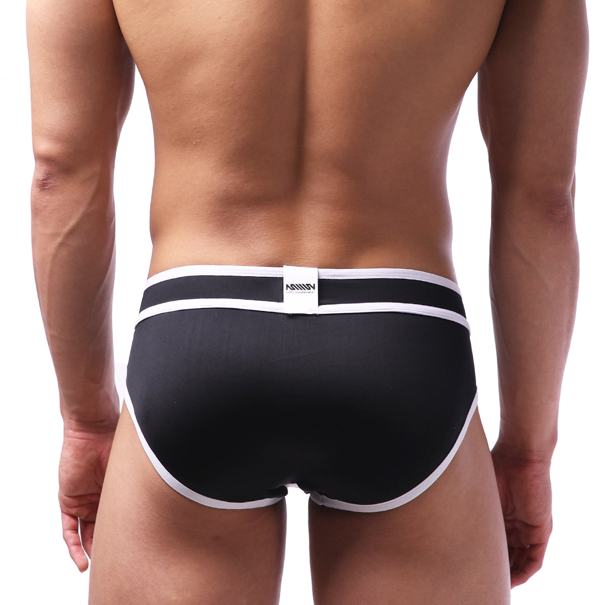 Black MetroMaleWear Bold swim brief with white trim and branded label at waistband designed for men