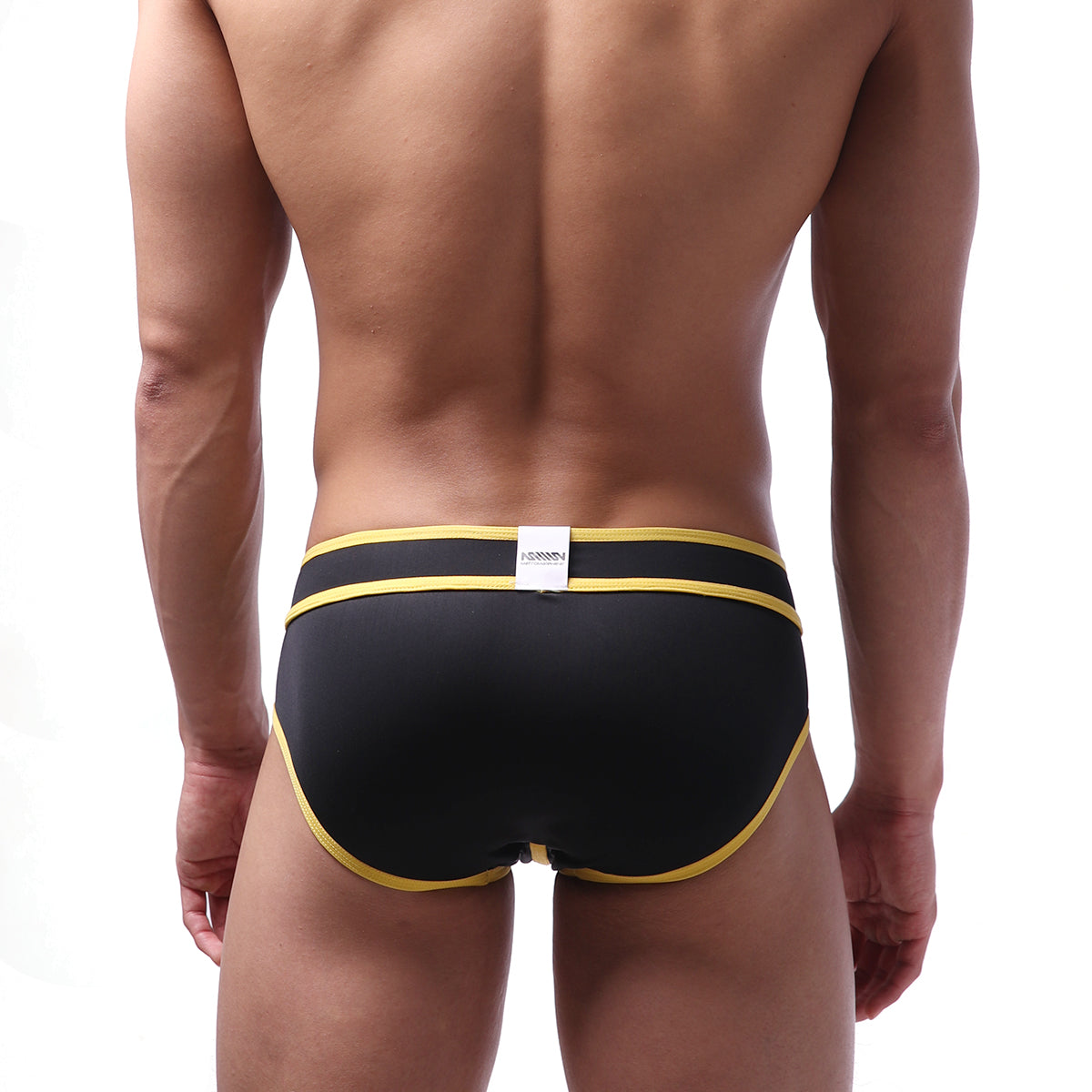 Black briefs with bold yellow trim and white MetroMaleWear brand tag on waistband for swimwear use