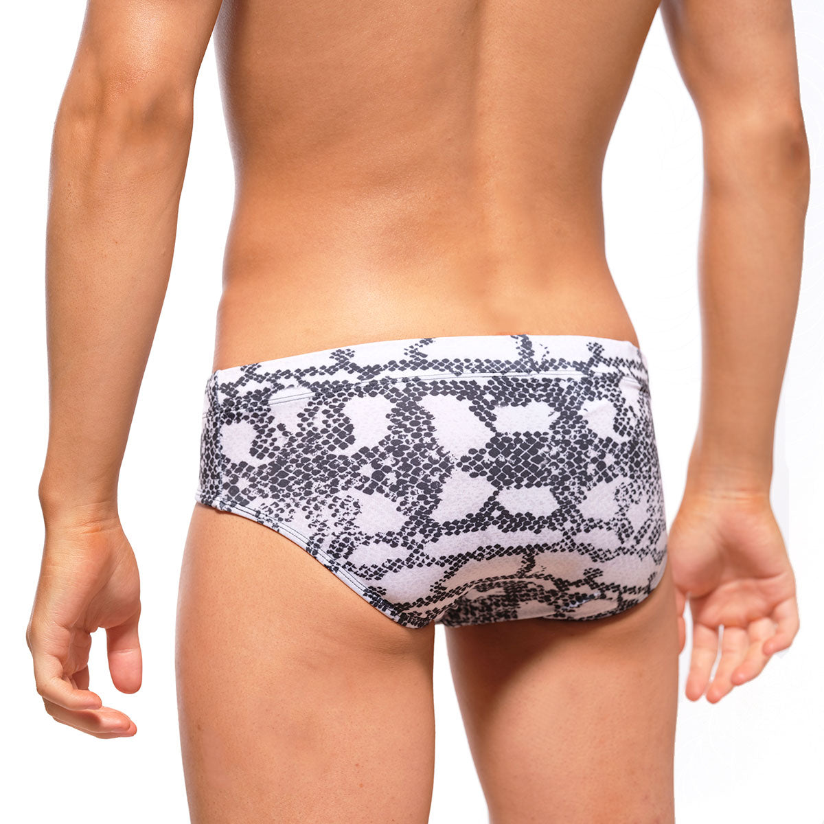 MetroMaleWear classic swim brief in white and black snake-scale pattern designed for swimming and beachwear