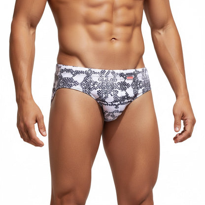 White swim trunks with a black snake scale pattern by metromalewear classic swim brief for stylish beachwear