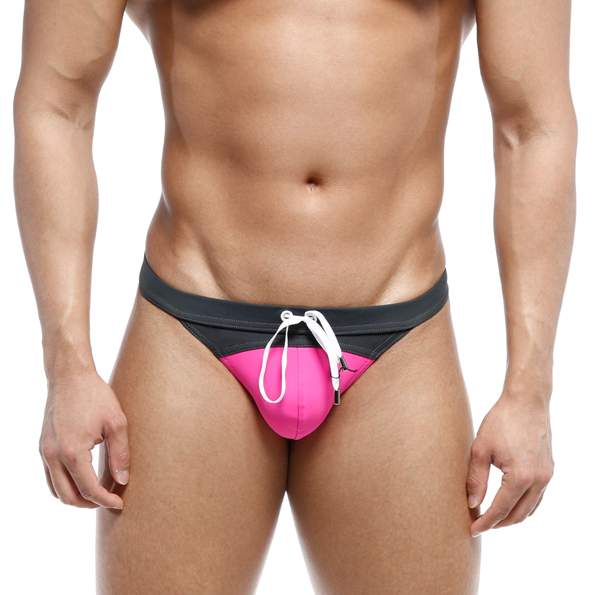 Bright pink and black metroMalewear resort swim thong with white drawstrings perfect for beach or pool use