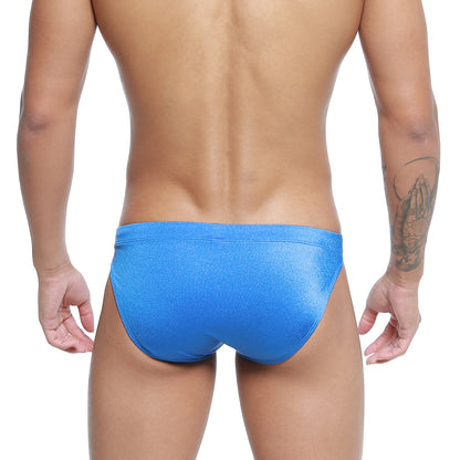 Vibrant blue shimmering fabric briefs with sleek form-fitting design from MetroMaleWear Vanguard Swim Bikini