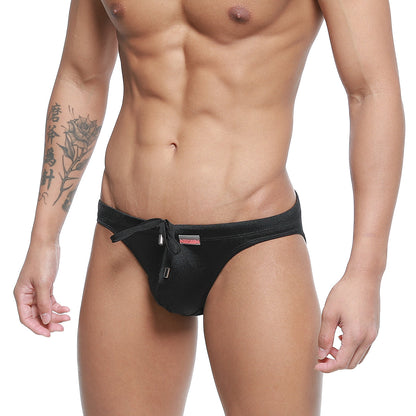 MetroMalewear vanguard swim bikini black satin swim trunks with drawstring waistband and small red logo on the side