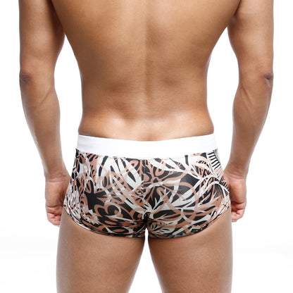 MetroMaleWear Profundo swim boxer briefs feature black beige and white abstract leaf pattern with solid white waistband