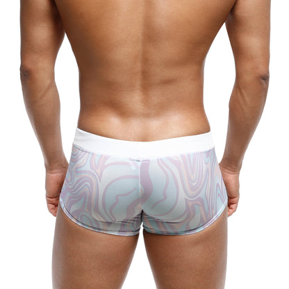 White waistband swim boxer briefs with pastel lavender and light blue swirl pattern from metromalewear profundo line