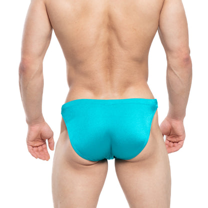 A vibrant turquoise metroMalewear lagoon swim bikini 4987-08 with form-fitting smooth fabric for stylish swimwear