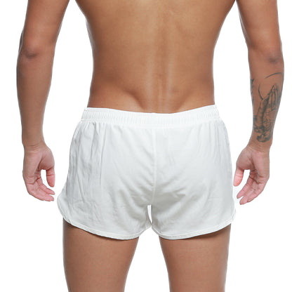White athletic swim shorts with elastic waistband and relaxed fit by metromalewear for summer use