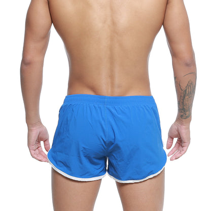 Bright blue MetroMaleWear summer swim shorts with white trim along hem and waistband for athletic use