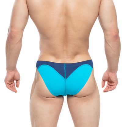 Bright turquoise and navy blue MetroMaleWear Splash Swim Bikini with sleek form-fitting design for athletic use